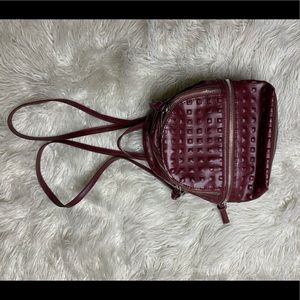 Maroon textured leather mini backpack
